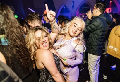 Attendees posing at the Church in Denver Nightclub