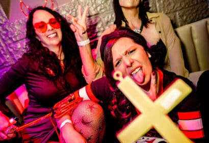 Attendees posing at the Church in Denver Nightclub