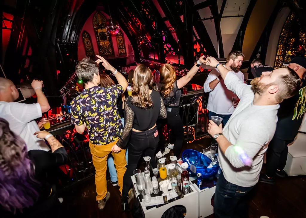 VIP bottle service attendees partying at church nightclub